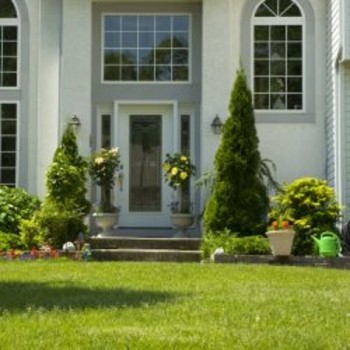 white house with a glass front door