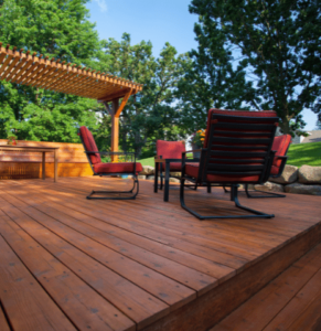 wood deck with table and 4 chairs with mosquito control